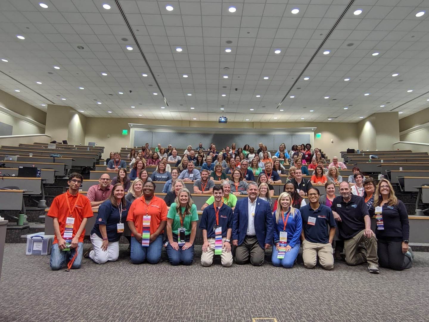 group photo with attendees at the vex conference